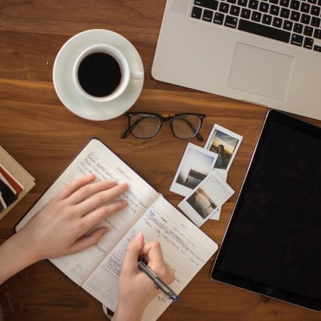 Person writing in a diary