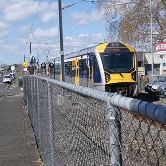 At train at level crossing