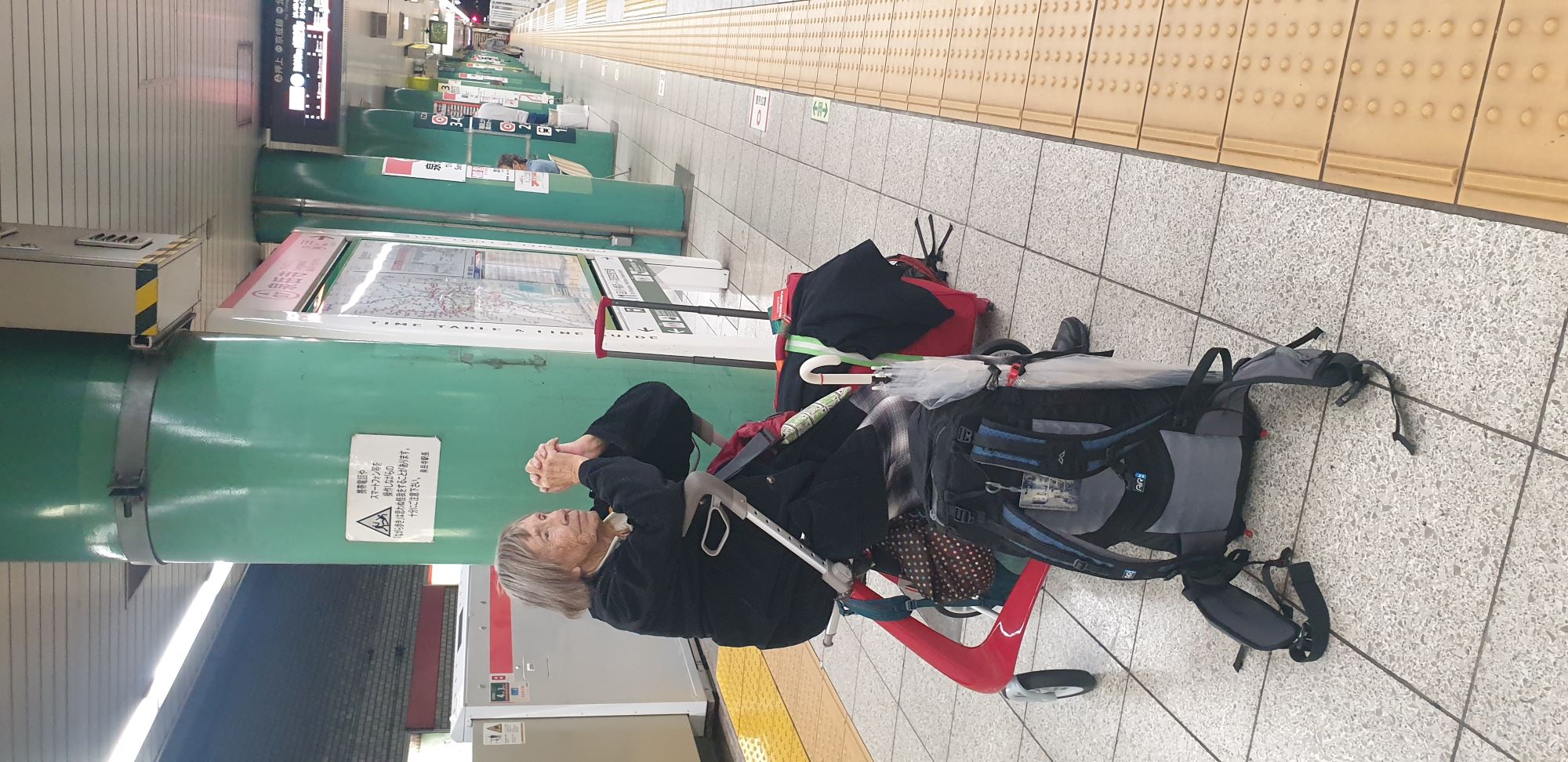 Sitting at a railway station